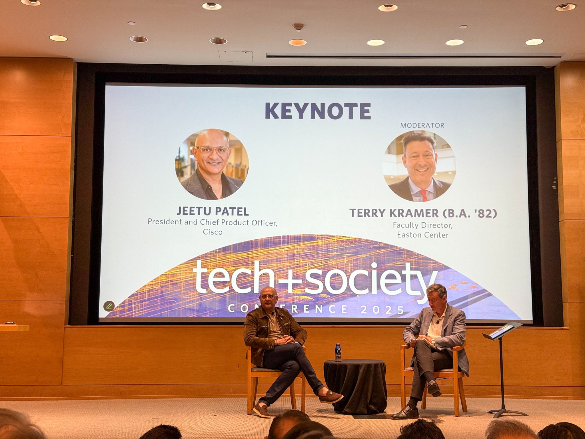Jeetu Patel and Terry Kramer on stage during the Tech + Society Conference 2025 keynote session.